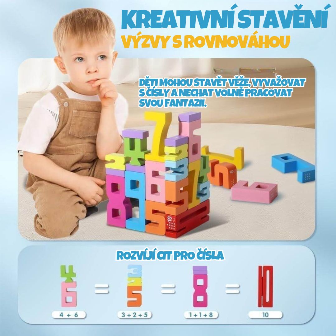 Malé dítě u kreativního stavění věží z barevných číselných kostek s ukázkou rozvíjení citu pro čísla a rovnováhu.
